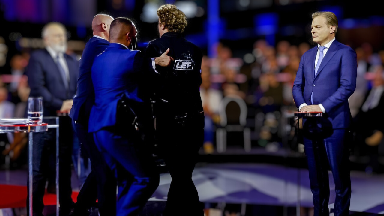 Protester storms onto stage and disrupts NOS final debate on the eve of Dutch elections